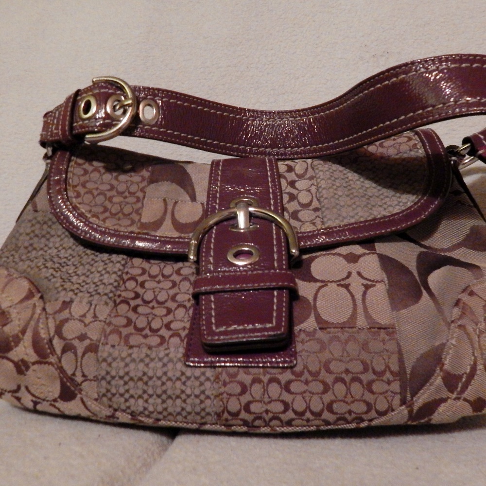 "COACH" hand bag.